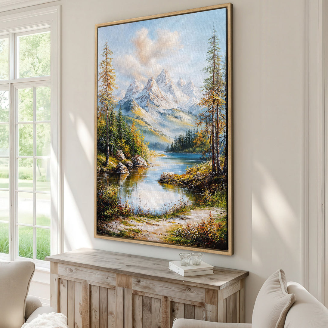 Framed Wall Art: Mountain landscape canvas print in warm tones. Serene nature scene with a lake, trees, and snow-capped mountains. Perfect for home decor.