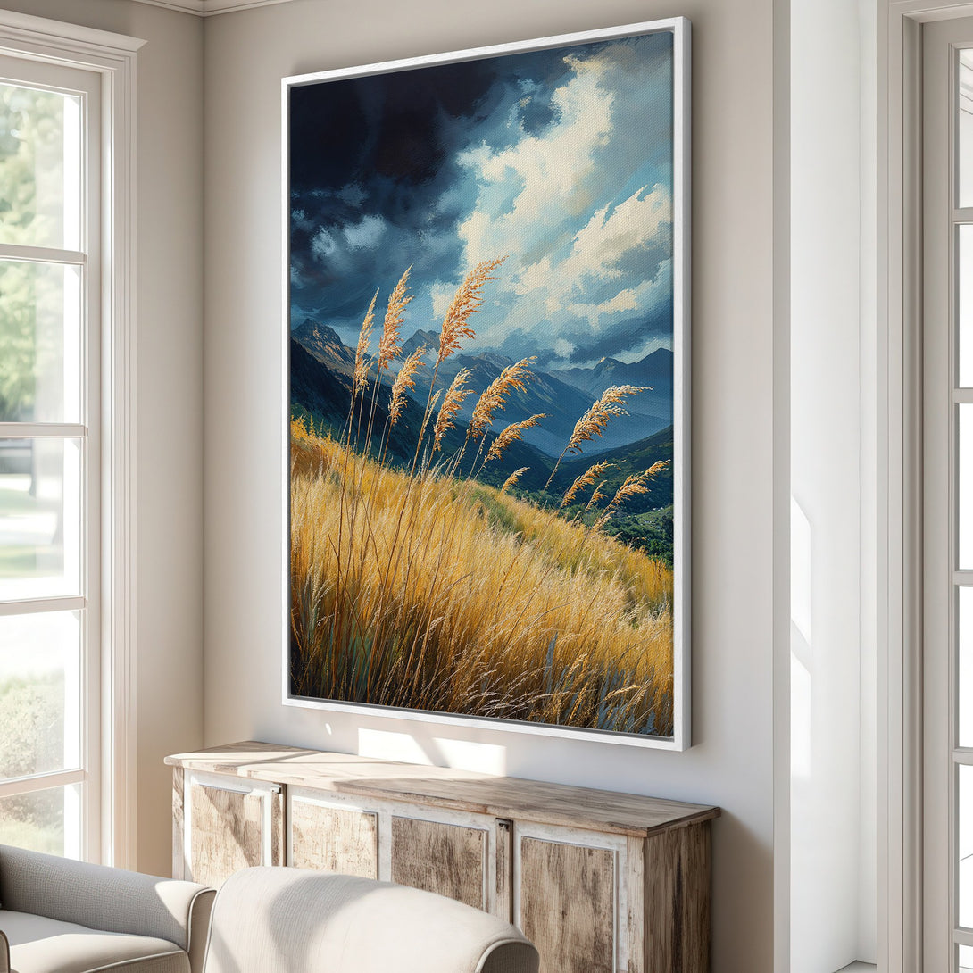 Framed Wall Art featuring a landscape of golden grass and mountains under a dramatic sky. Earthy tones create a calming, stylish aesthetic.