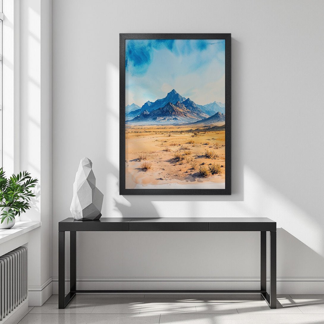 Framed Poster featuring a watercolor mountain landscape in blue and tan tones. Perfect wall art for a modern home!