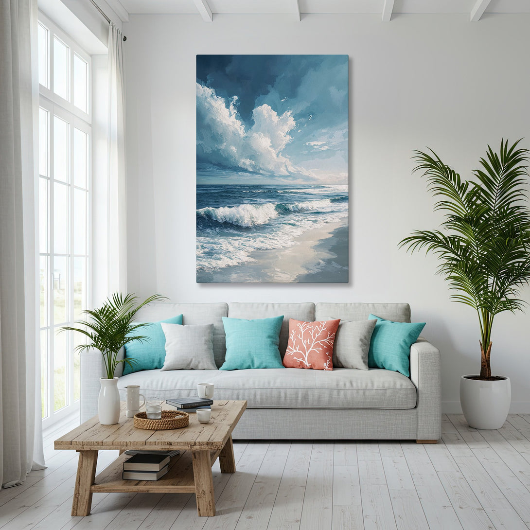 Framed Wall Art: Coastal seascape canvas print in a modern living room. Blue and white color palette, evoking a serene beach vibe.