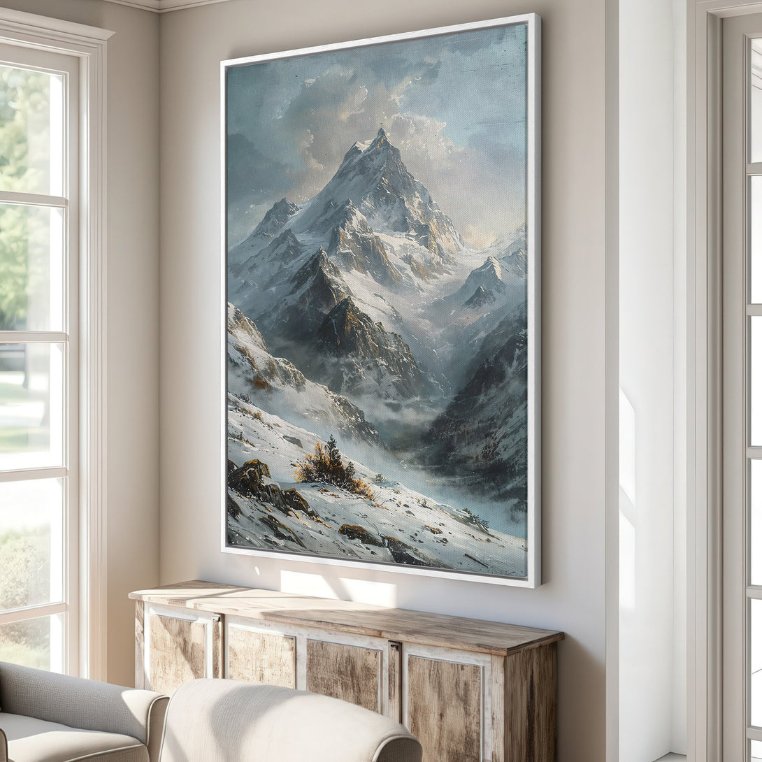 Framed Wall Art featuring a majestic mountain landscape in a cool, muted color palette. Perfect for adding a touch of serene beauty to your home.