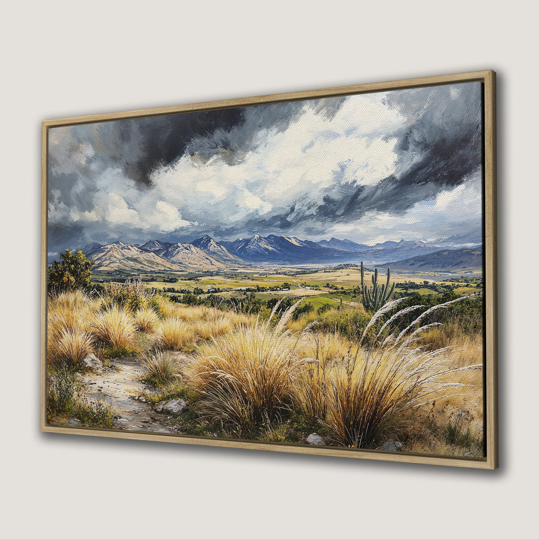 Framed Wall Art Canvas Print of a landscape painting with mountains, dramatic clouds, and warm, earthy tones. Perfect for home decor.
