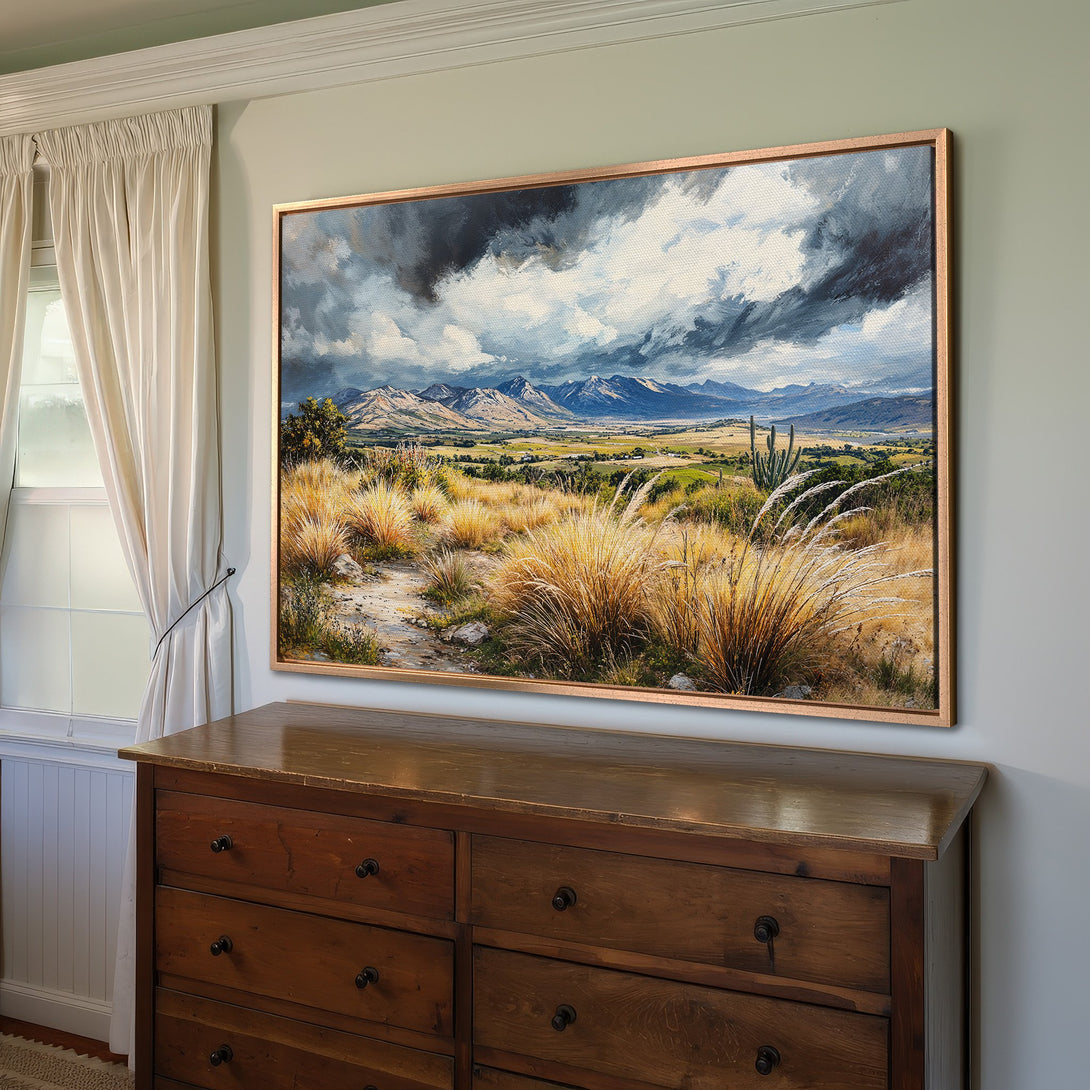 Framed Wall Art: Landscape Canvas Print with mountains, field, and stormy sky. Earthy tones with blue, green, and gold palette. Perfect for home decor.