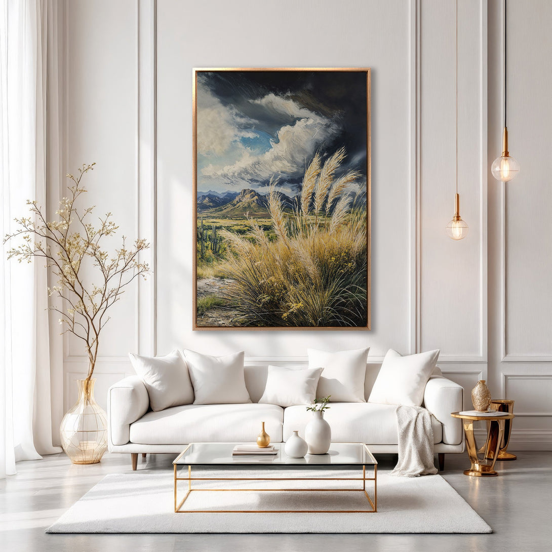 Framed Wall Art: Dramatic landscape Canvas Print with moody sky and golden grasses, displayed in a bright, modern living room. Earthy tones.