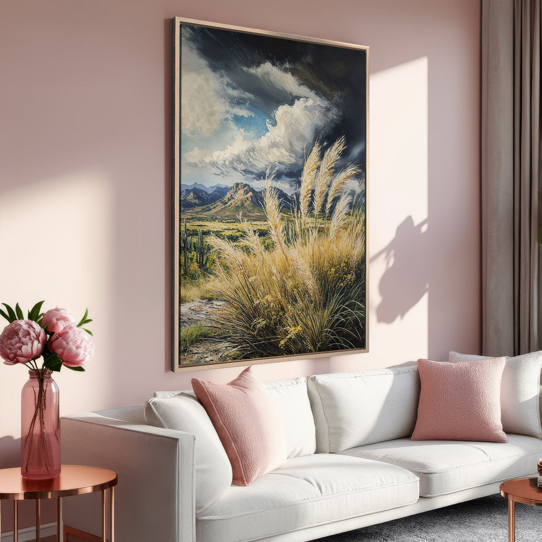 Framed Wall Art: Dramatic landscape canvas print with moody skies & golden grasses. Earthy tones of beige, blue, and yellow create a calming, stylish interior.
