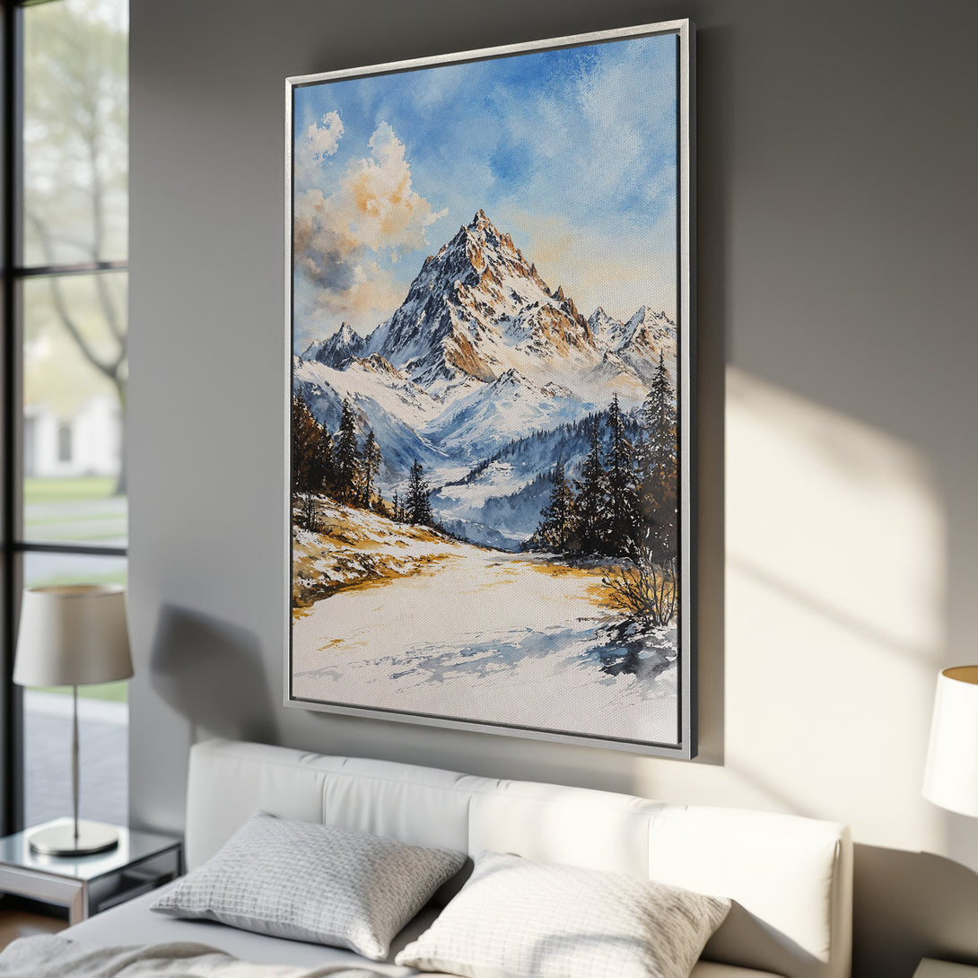 Framed Wall Art: Stunning mountain landscape canvas print in watercolor style. Features blue, white, and gold hues. Perfect for adding a touch of nature to your home!