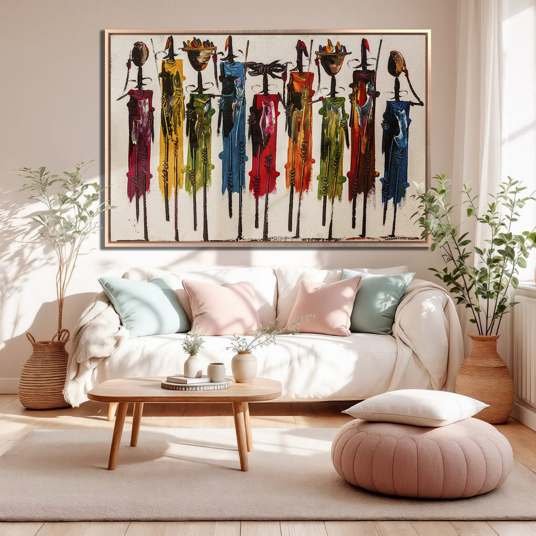 Framed Wall Art: Abstract figures in vibrant colors. Modern canvas print adds a pop of color to a neutral living room. Shop now!
