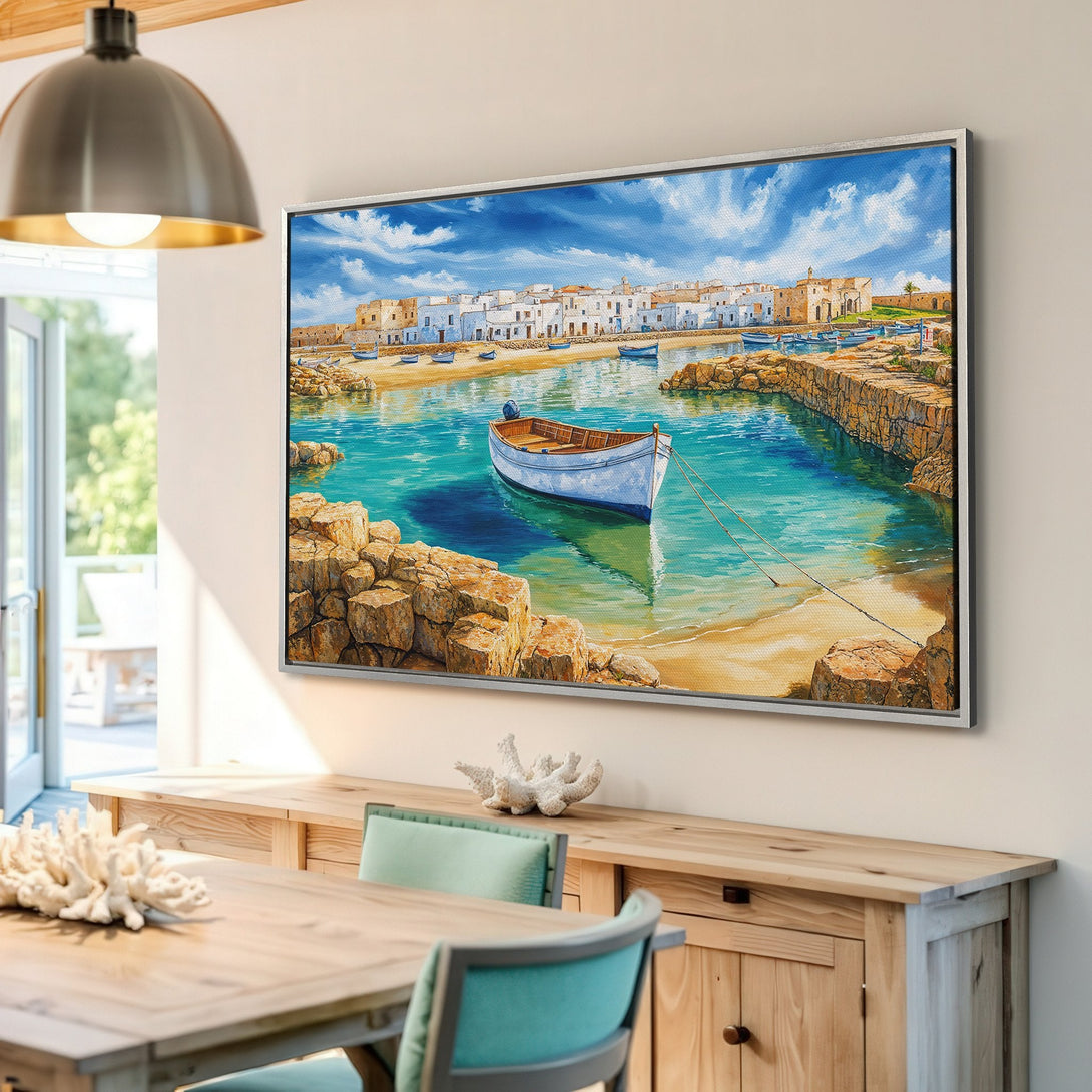 Canvas Print of a coastal village scene with a boat, in a vibrant blue and white palette. Perfect wall art for a serene interior.