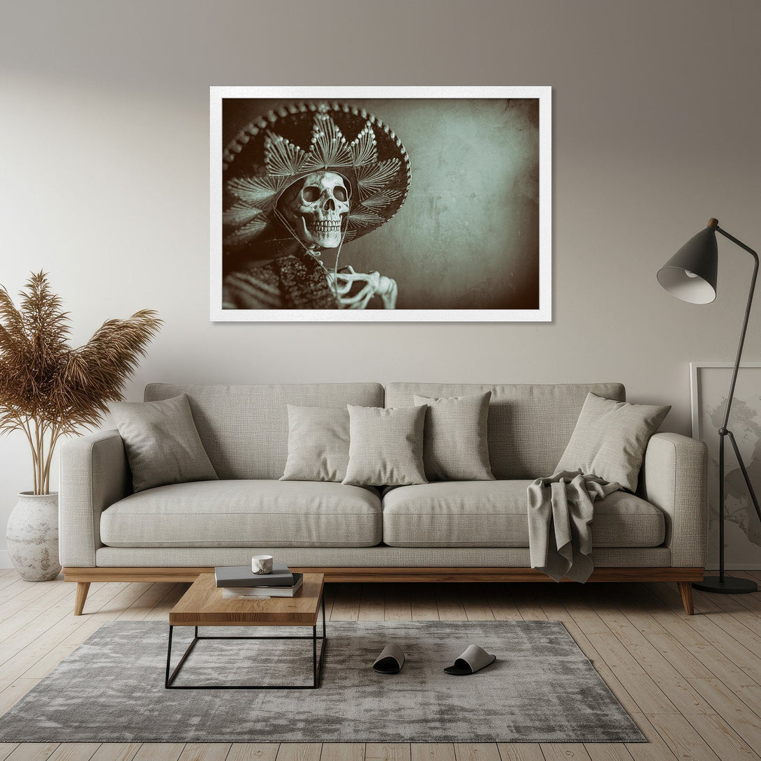 Framed Poster featuring a skeleton in a sombrero, vintage style, with a muted green and sepia color palette. Perfect wall art!