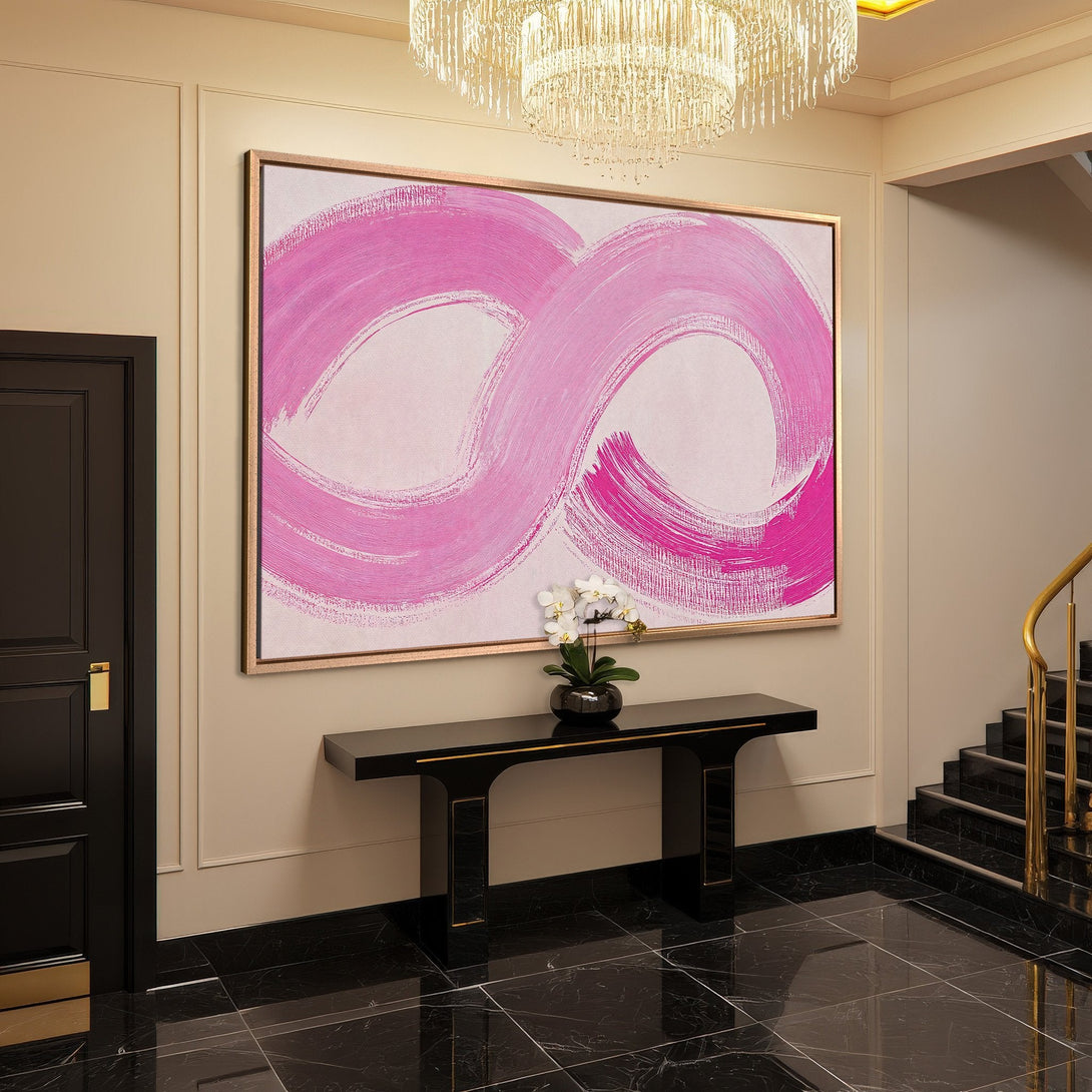 Framed Wall Art: Abstract pink brushstroke art in a modern entryway. Adds a pop of color to any space.