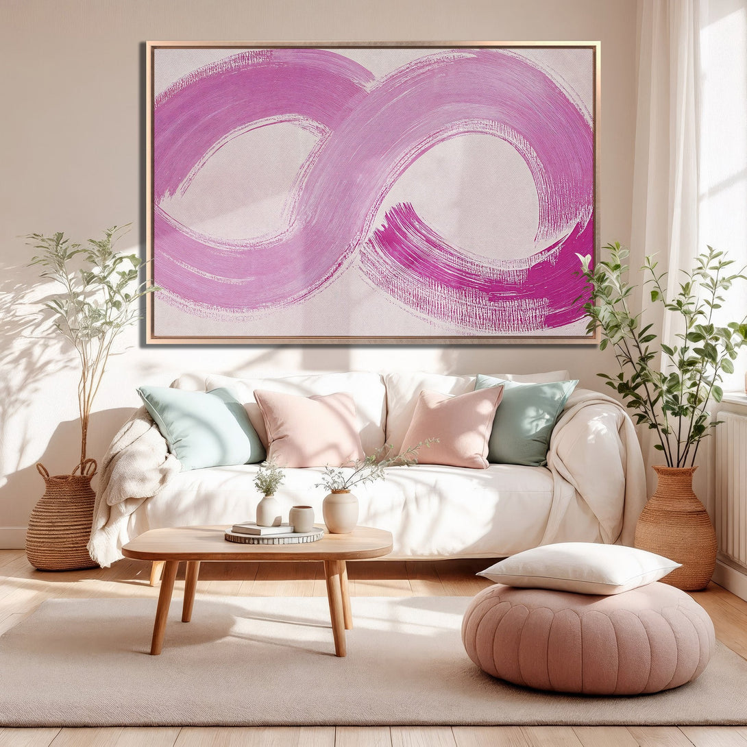 Framed Wall Art featuring abstract pink brushstrokes. Modern art canvas print adds a pop of color to any living room. Perfect for home decor.