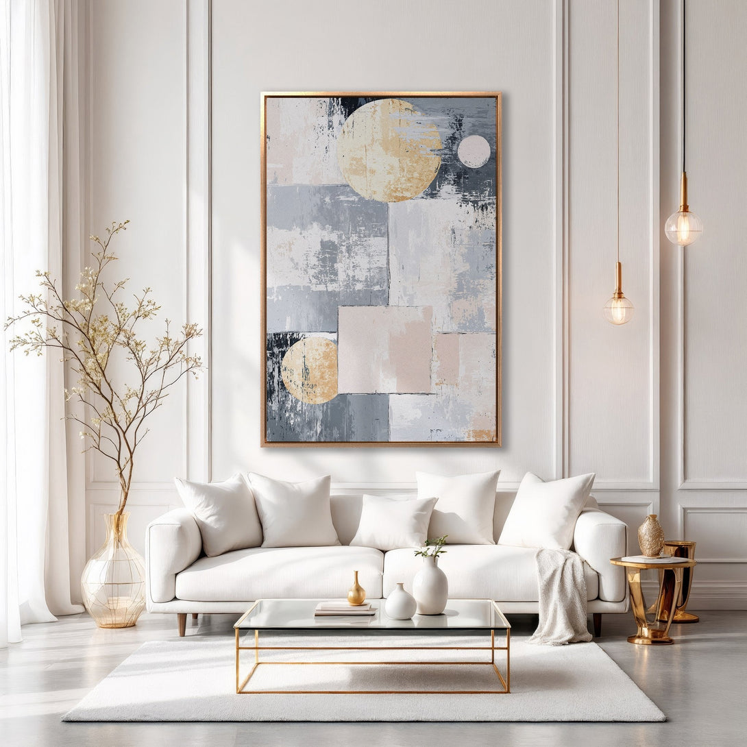 Framed Wall Art: Abstract geometric painting in neutral tones (gray, beige, white) with a gold frame. Modern art for living room decor.