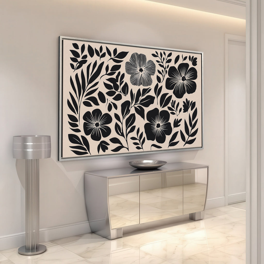 Framed Wall Art featuring a black and beige floral design. Modern style Canvas Print adds a touch of elegance to any interior space.