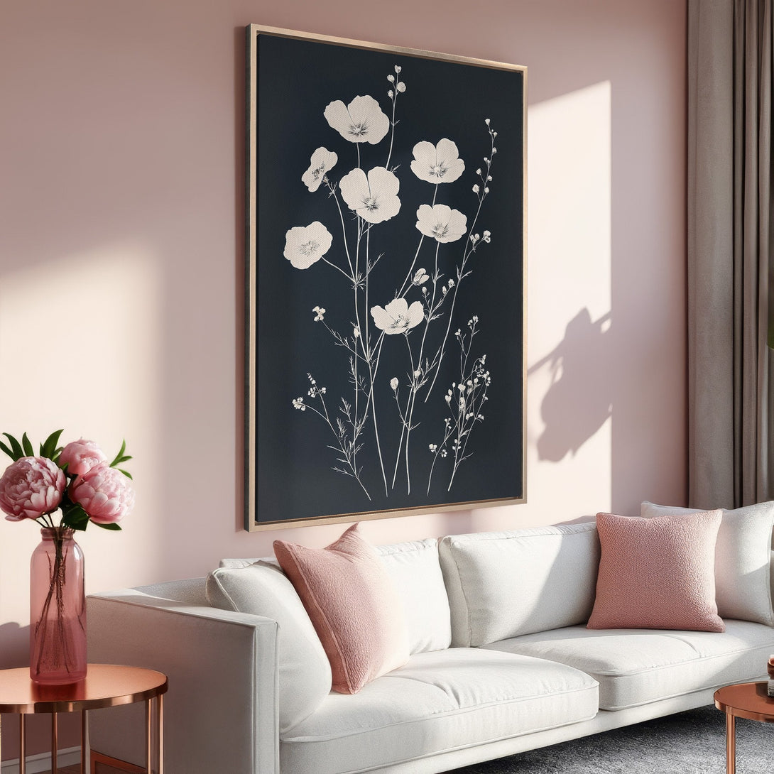 Framed Wall Art: Elegant floral art print in a modern interior. Features white botanical details on a dark background. Soft pink and neutral color palette.