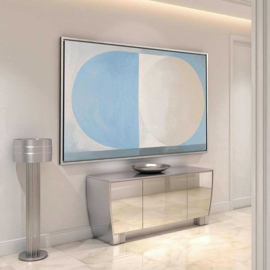 Framed Wall Art: Abstract blue and cream circle design. Modern style canvas print in a neutral interior. Perfect for adding a pop of color.