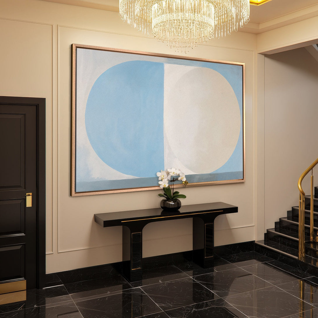 Framed Wall Art: Abstract blue and white circles canvas print in a modern interior. Soft, neutral color palette. Elevate your space today!