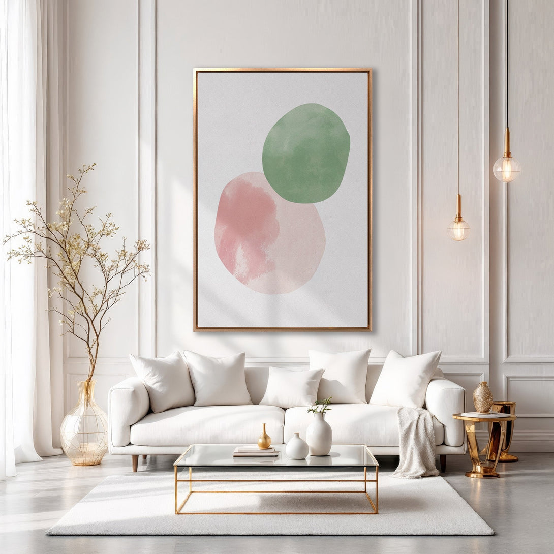 Framed Wall Art: Abstract watercolor art in pink and green. Modern Canvas Print adds a pop of color to a bright, minimalist living room.