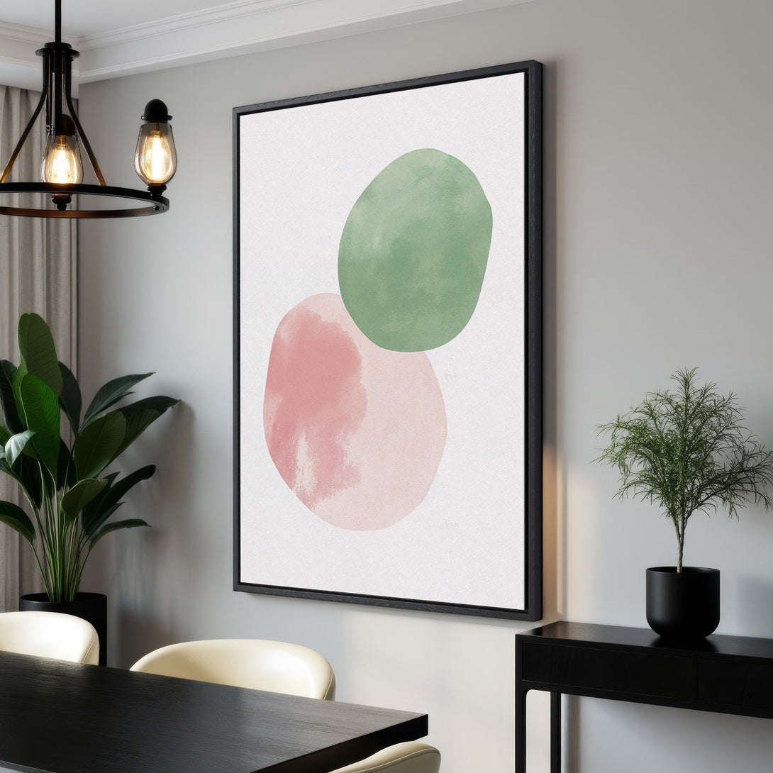 Framed Wall Art featuring abstract watercolor shapes in pink and green. Modern Canvas Print adds a touch of elegance to any interior.
