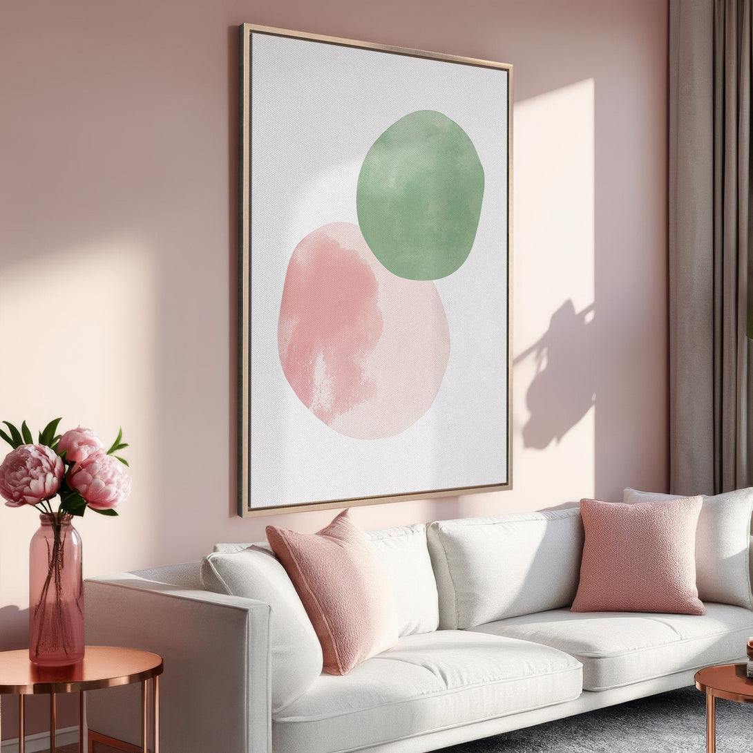 Framed Wall Art featuring abstract watercolor shapes in pink and green. Perfect for adding a touch of modern art to your living room decor.