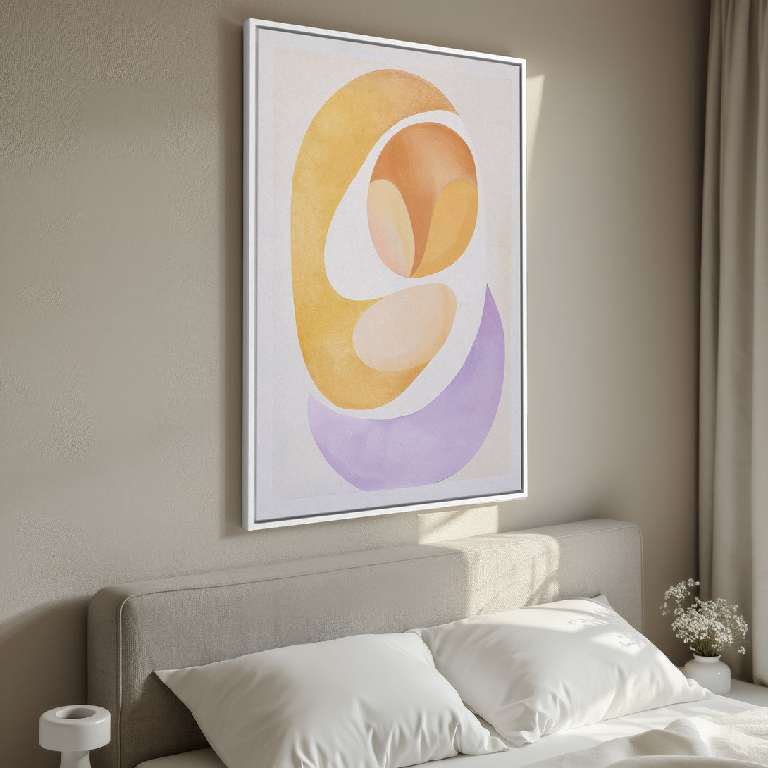Framed Wall Art featuring an abstract watercolor design in warm yellow, orange, and purple tones. Perfect for adding a touch of modern art to your bedroom.