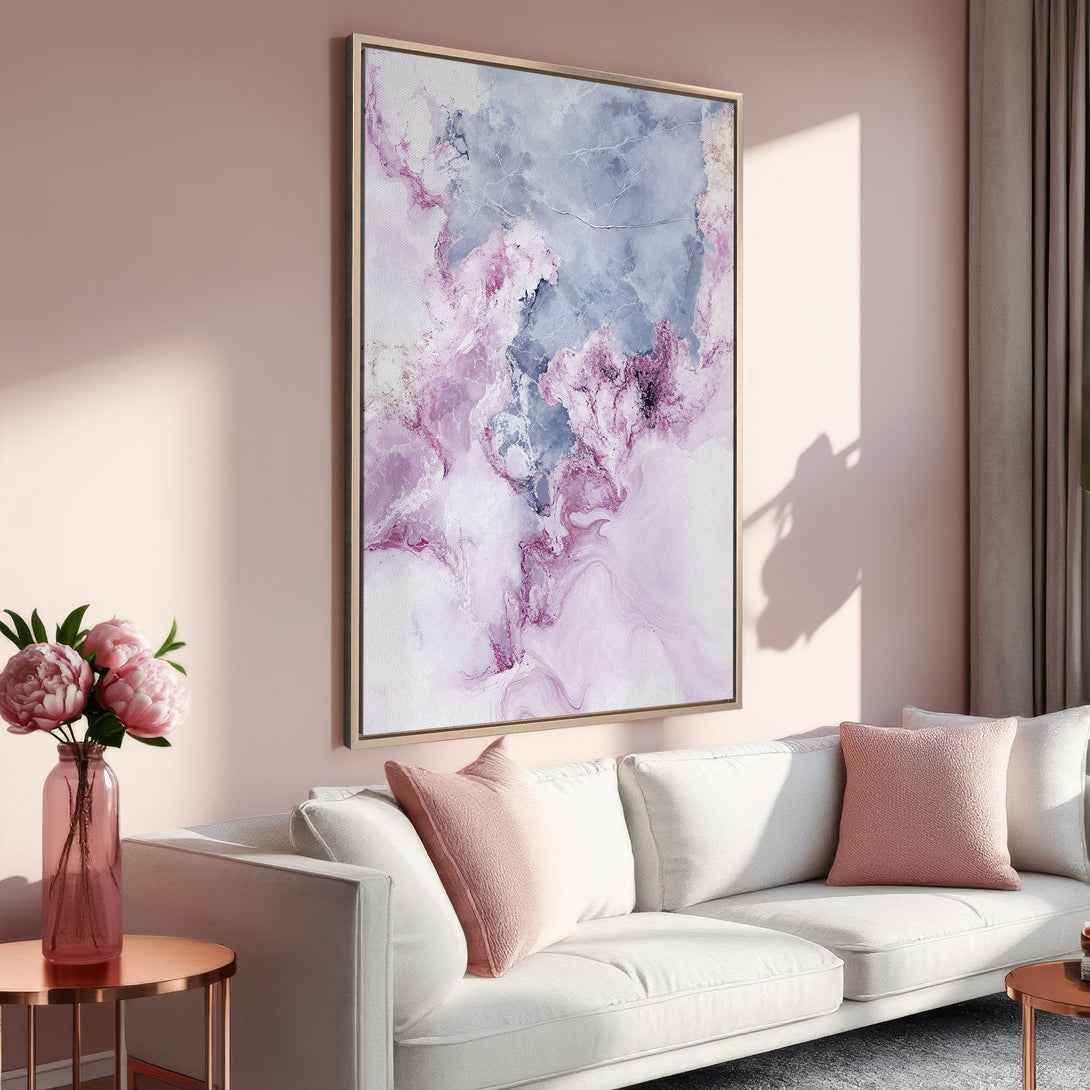 Framed Wall Art: Abstract pink and blue canvas print in a modern living room. Enhance your space with this stylish, colorful artwork!