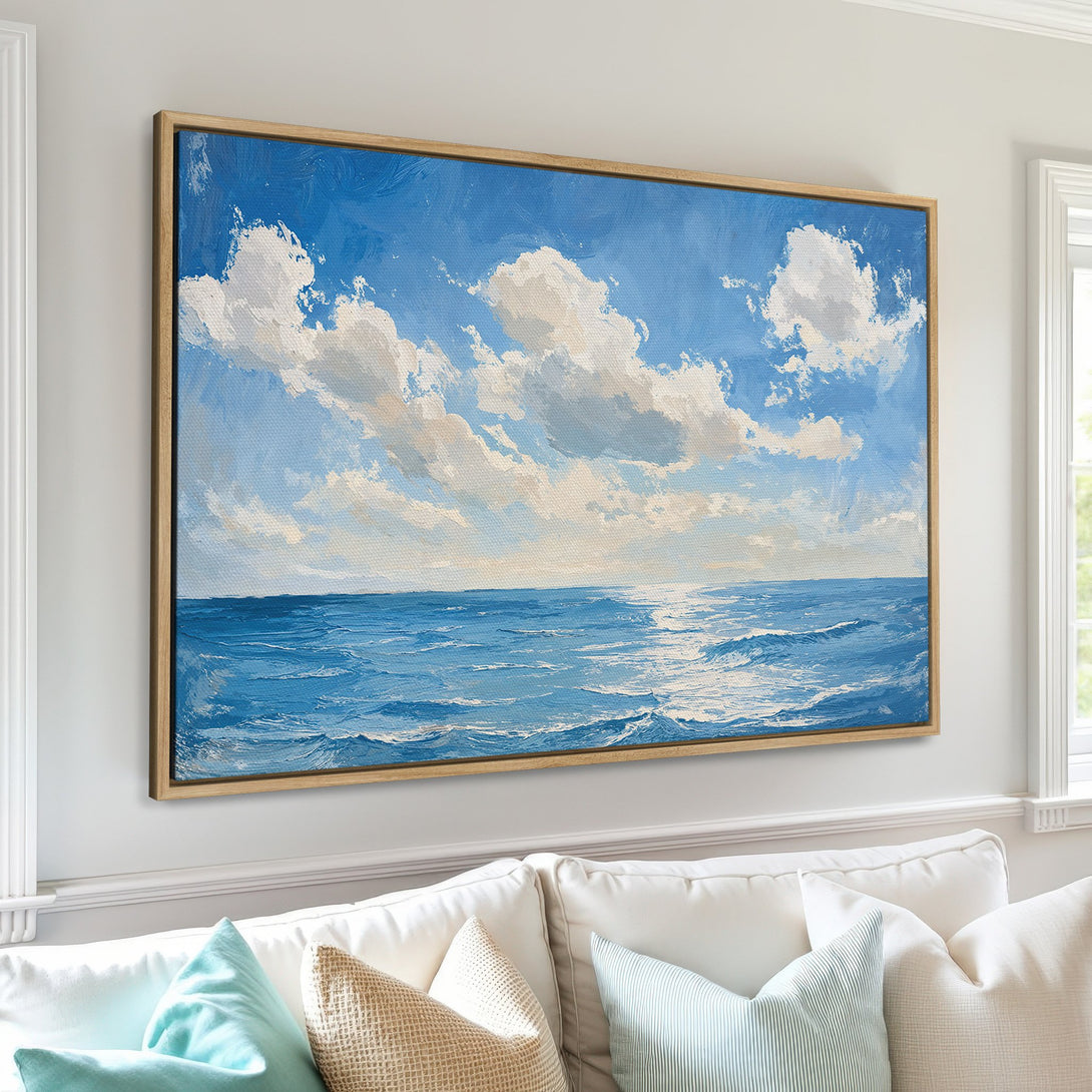 Framed Wall Art: Stunning ocean view Canvas Print in blue and white. Coastal art style, perfect for adding a touch of serenity to your home decor.