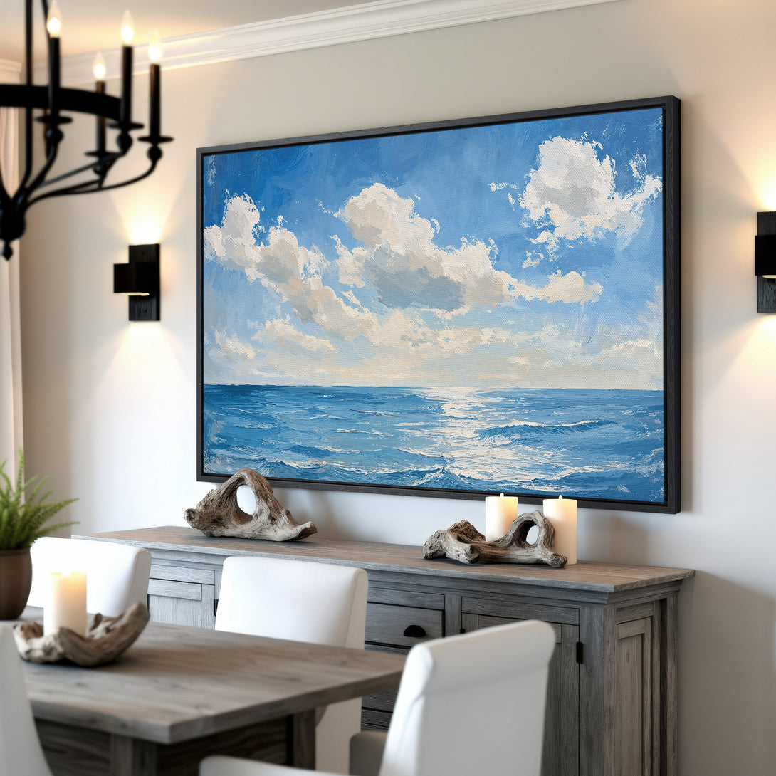 Framed Wall Art: Ocean landscape Canvas Print in blue and white, perfect for coastal decor. Adds a serene touch to any room.