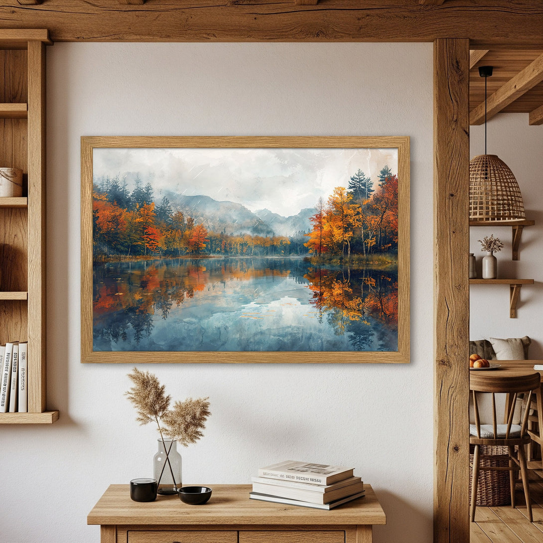 Framed Poster of a serene lake scene with autumn trees. Watercolor style with warm orange, blue, and green tones. Perfect wall art.