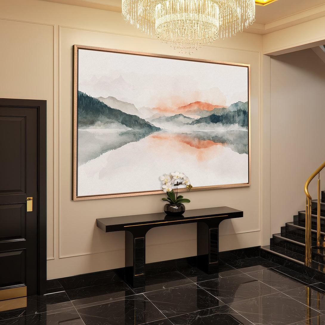 Framed Wall Art: Watercolor landscape Canvas Print in a modern interior. Features a serene mountain scene with a calming green, orange, and grey color palette.
