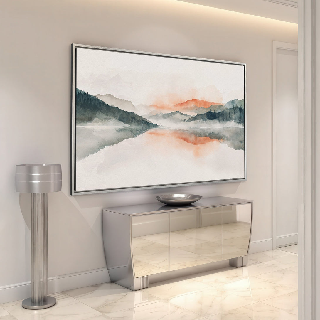 Framed Wall Art: Watercolor landscape Canvas Print in a modern interior. Features a serene mountain scene with muted greens, oranges, and grays. Perfect for home decor.