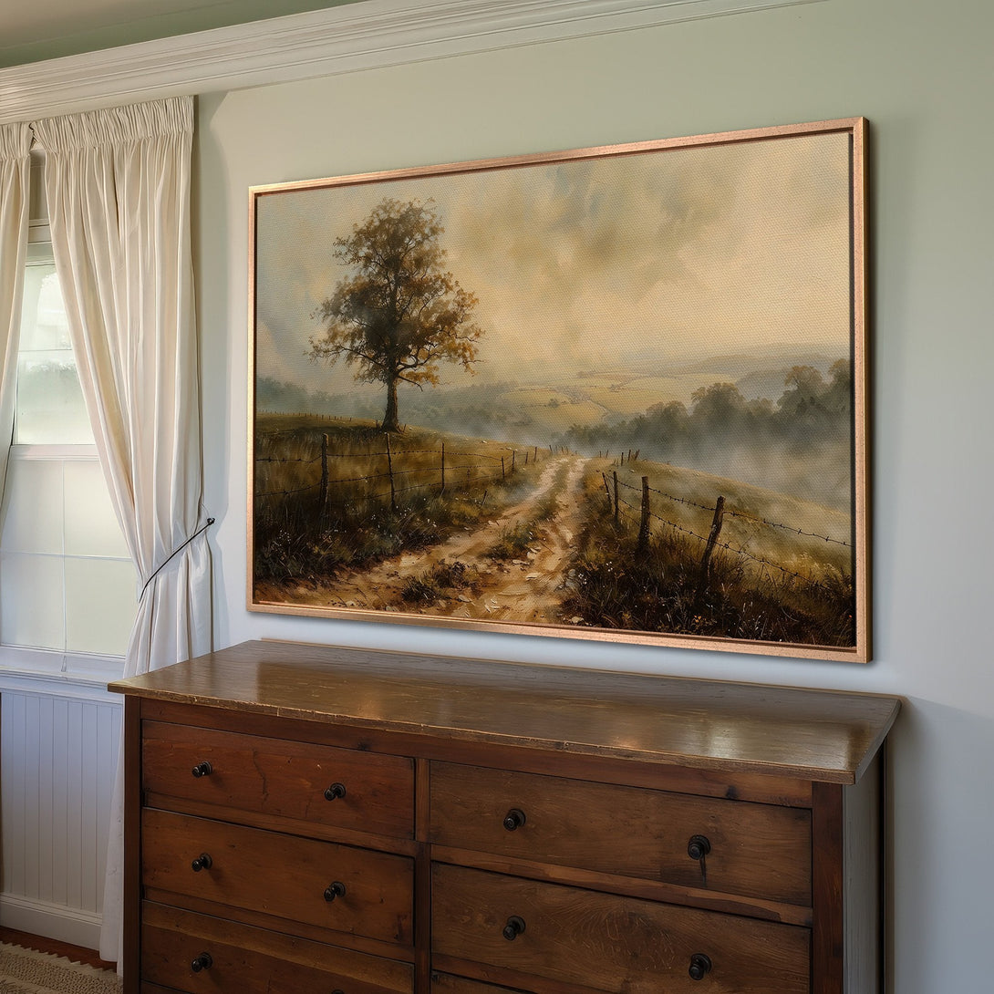 Framed Wall Art: Landscape Canvas Print in warm earth tones, featuring a tree and dirt road, perfect for adding a touch of rustic charm.