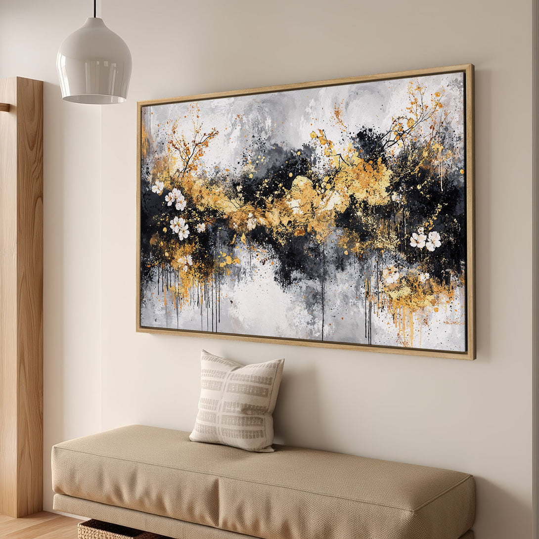 Framed Wall Art featuring an abstract floral design in gold, black, and gray. Modern canvas print adds elegance to any interior.
