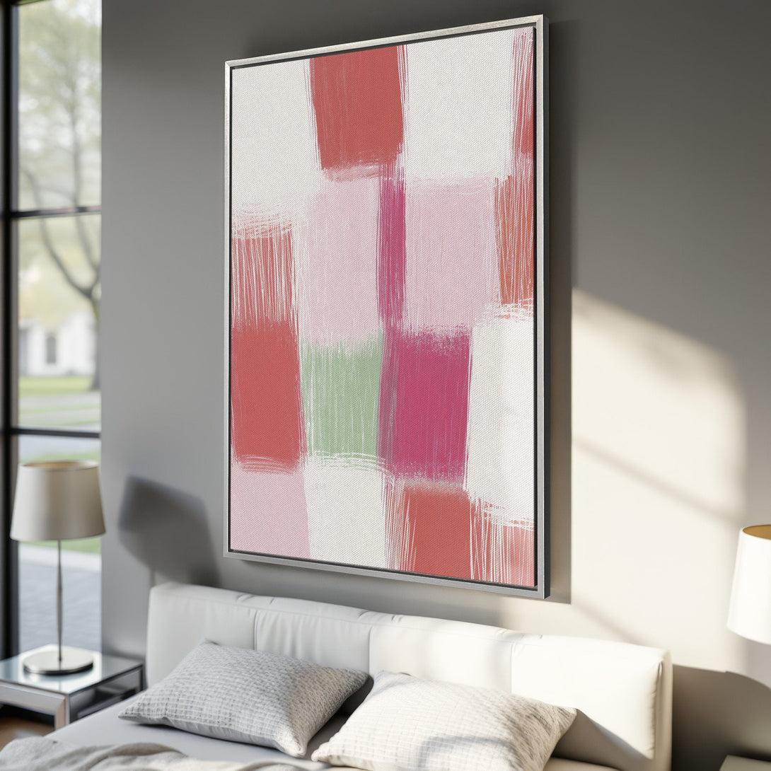 Framed Wall Art: Abstract brushstroke canvas print in a modern bedroom. Features a warm color palette of pinks, reds, and white, perfect for adding a pop of color.