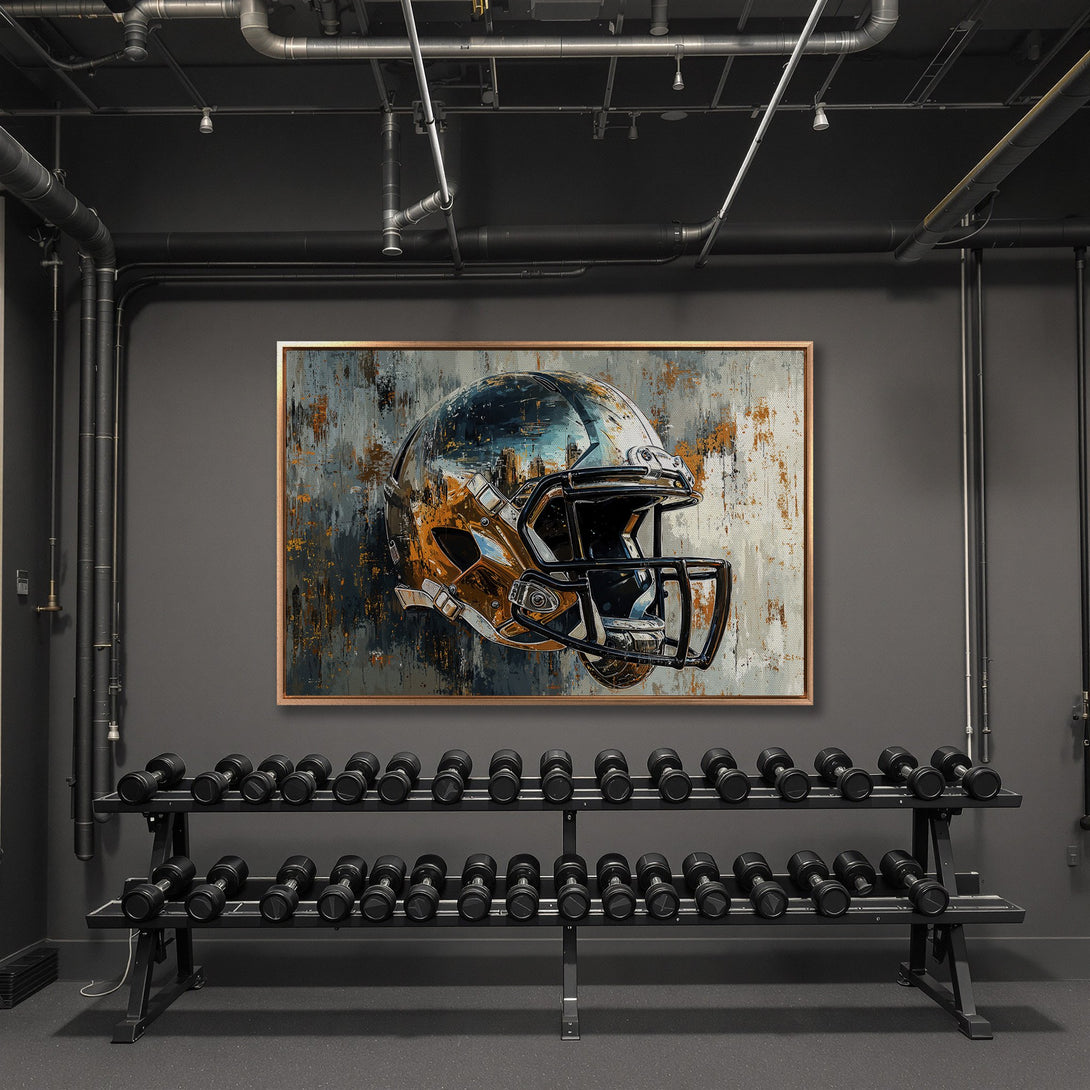 Framed Wall Art: Abstract football helmet art in a modern gym. Industrial style with a gray, blue, and gold color palette. Elevate your space with this unique canvas print!