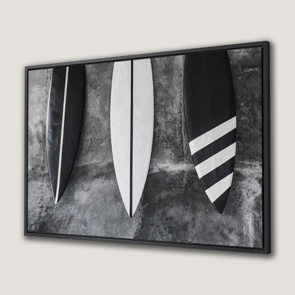 Framed Wall Art featuring surfboards in black and white against a textured gray background. Modern coastal decor for your home.