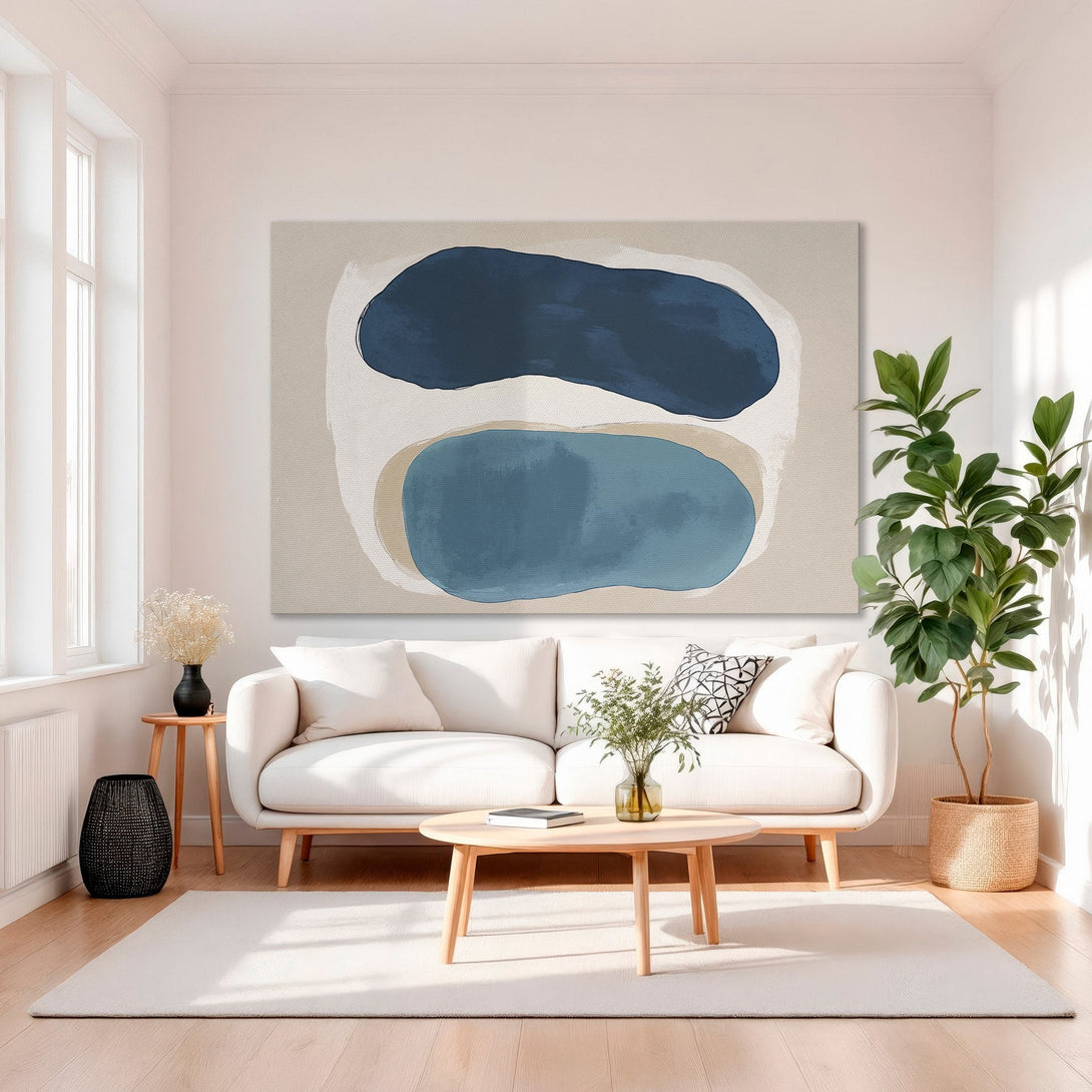 Framed Wall Art: Abstract blue and beige art print in a modern living room. Neutral color palette, perfect for adding a touch of elegance.