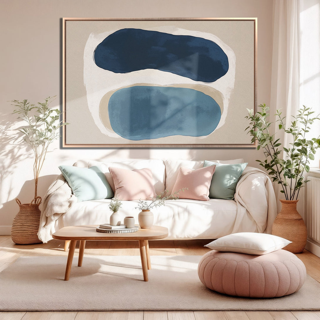 Framed Wall Art: Abstract blue and beige canvas print in a modern living room. Soft, neutral color palette. Elevate your home decor!