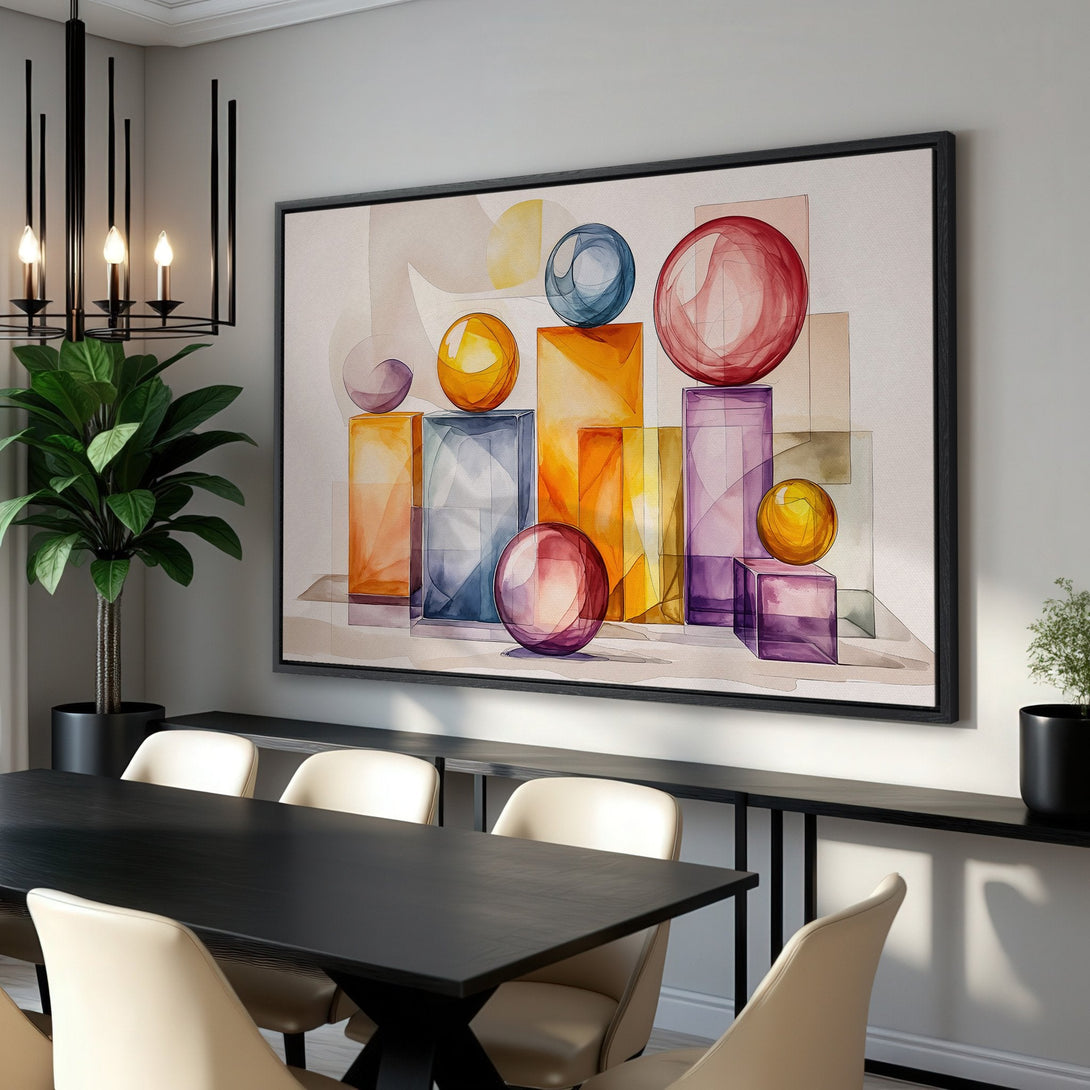 Framed Wall Art: Abstract geometric art print with watercolor style, featuring colorful spheres & blocks in a modern dining room. Warm color palette.