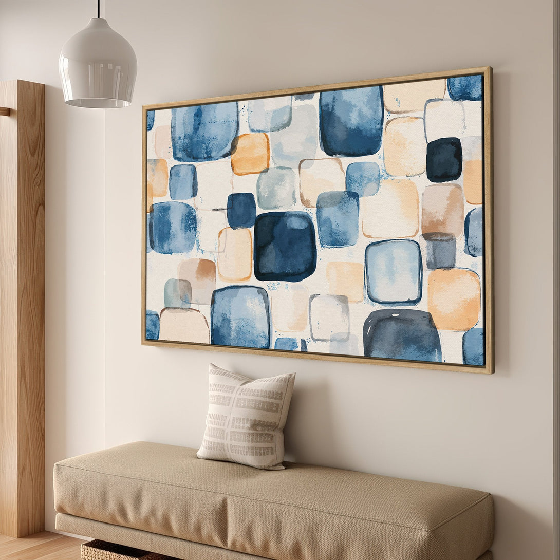Framed Wall Art featuring an abstract watercolor design with blue, beige, and tan squares. Perfect for adding a modern touch to any interior.