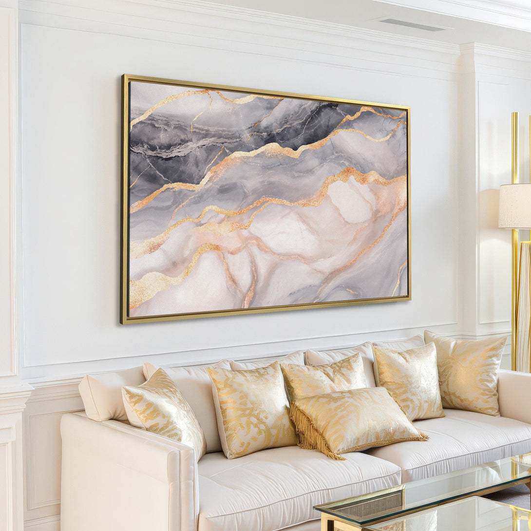 Abstract Canvas Print in a modern living room. Features a marble-like design with gold accents, in a neutral gray and white palette. Perfect wall art for any space!
