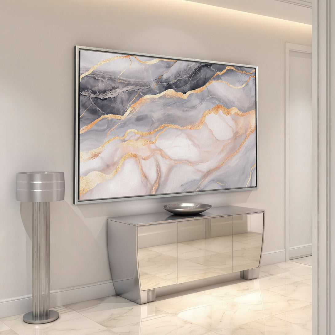 Framed Wall Art featuring abstract gold and gray artwork. Modern canvas print adds elegance to any interior. Perfect for living rooms and hallways.