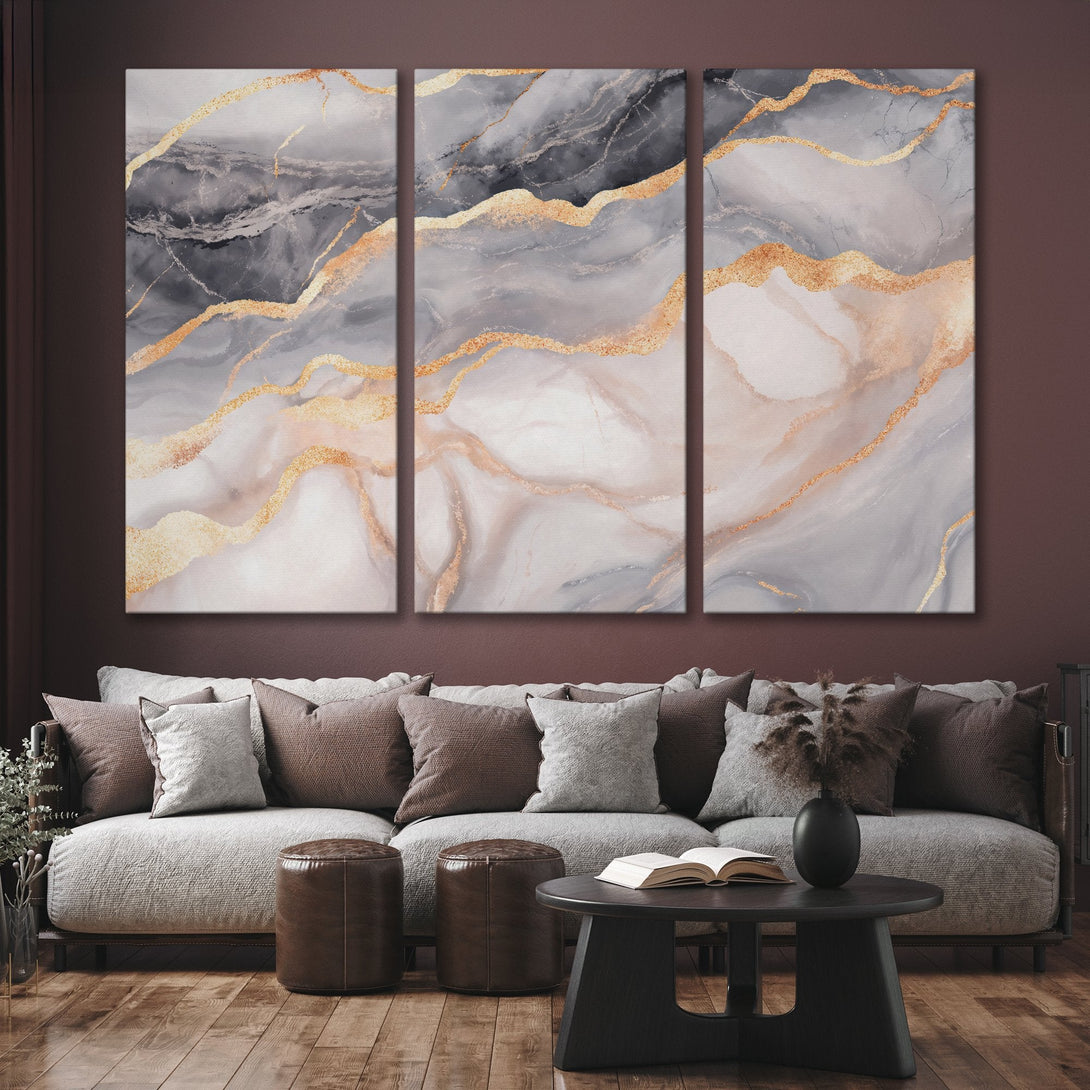 Abstract Canvas Print triptych in gold, gray, and white, adding modern elegance to any interior. Perfect for living rooms and bedrooms.