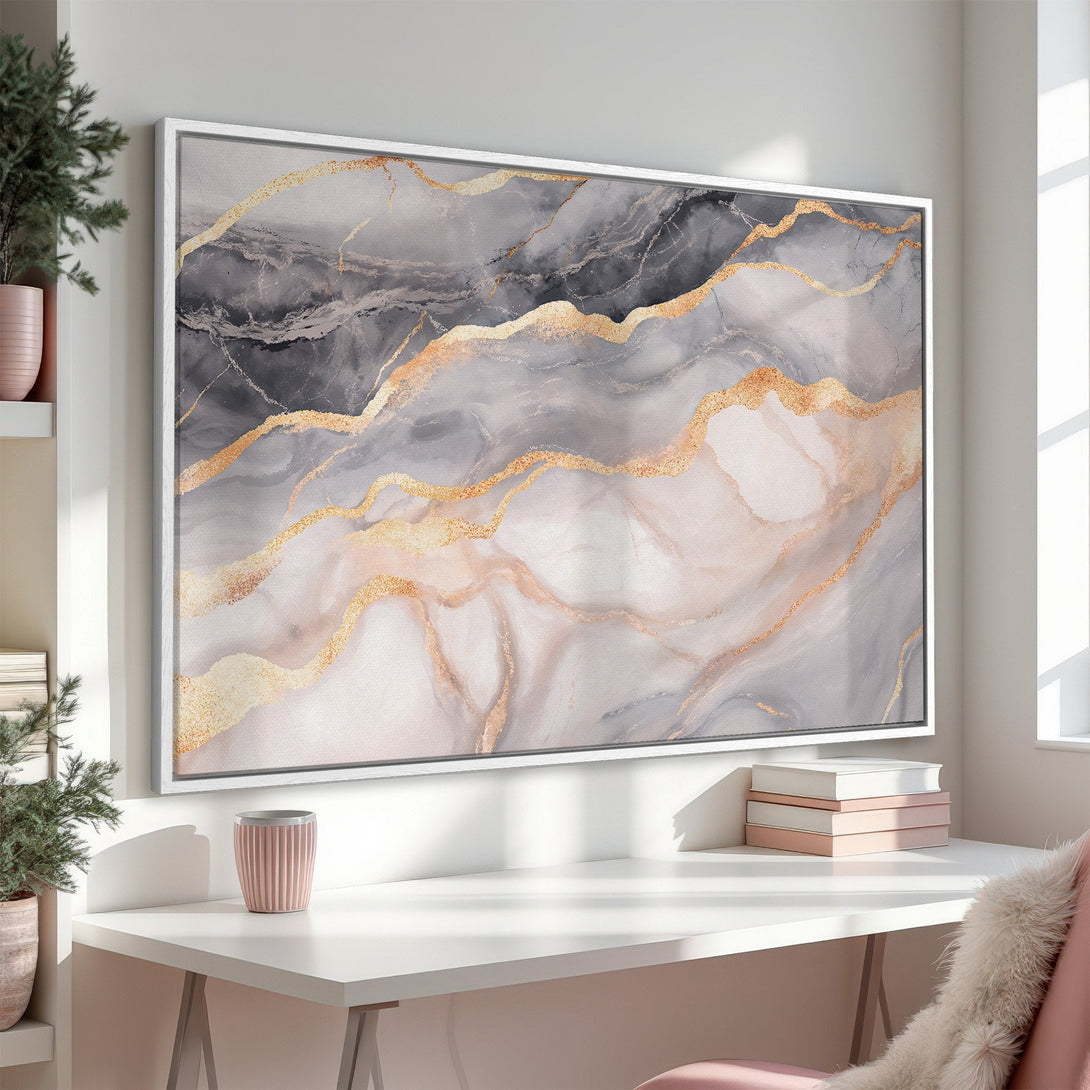 Framed Wall Art featuring an abstract marble design in gray, gold, and blush tones. Add a touch of elegance to your space with this stunning Canvas Print.