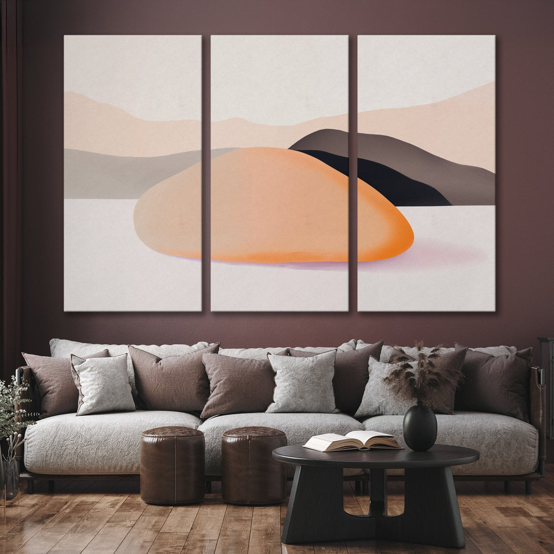 Abstract Canvas Print triptych featuring warm, earthy tones. Modern art in a living room setting. Shop now for stylish wall decor!