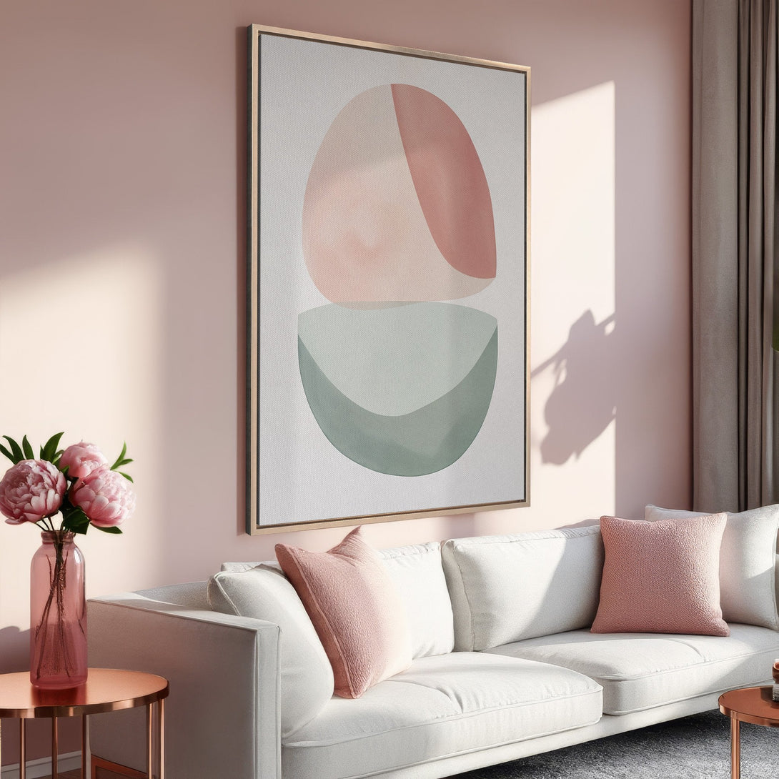 Framed Wall Art in a modern living room. Abstract shapes in blush pink and sage green. Perfect for adding a touch of elegance to your home decor.