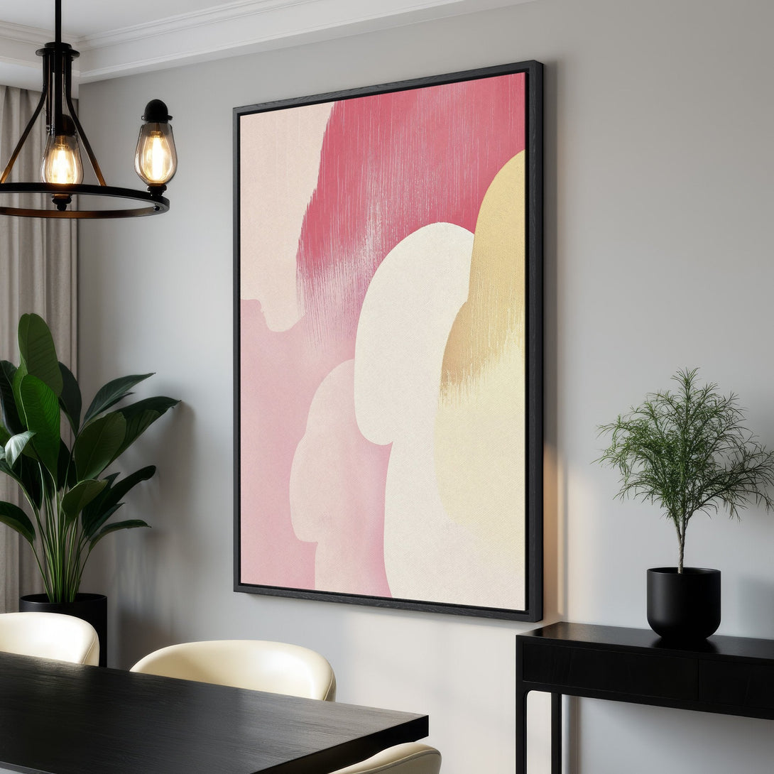 Framed Wall Art featuring abstract pink and cream shapes. Modern canvas print with a minimalist style, perfect for adding a pop of color to any room.