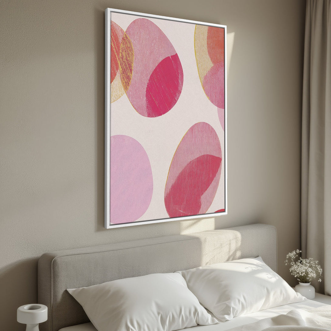 Framed Wall Art featuring abstract pink and red circles. Modern art canvas print with a neutral color palette, perfect for bedroom decor.