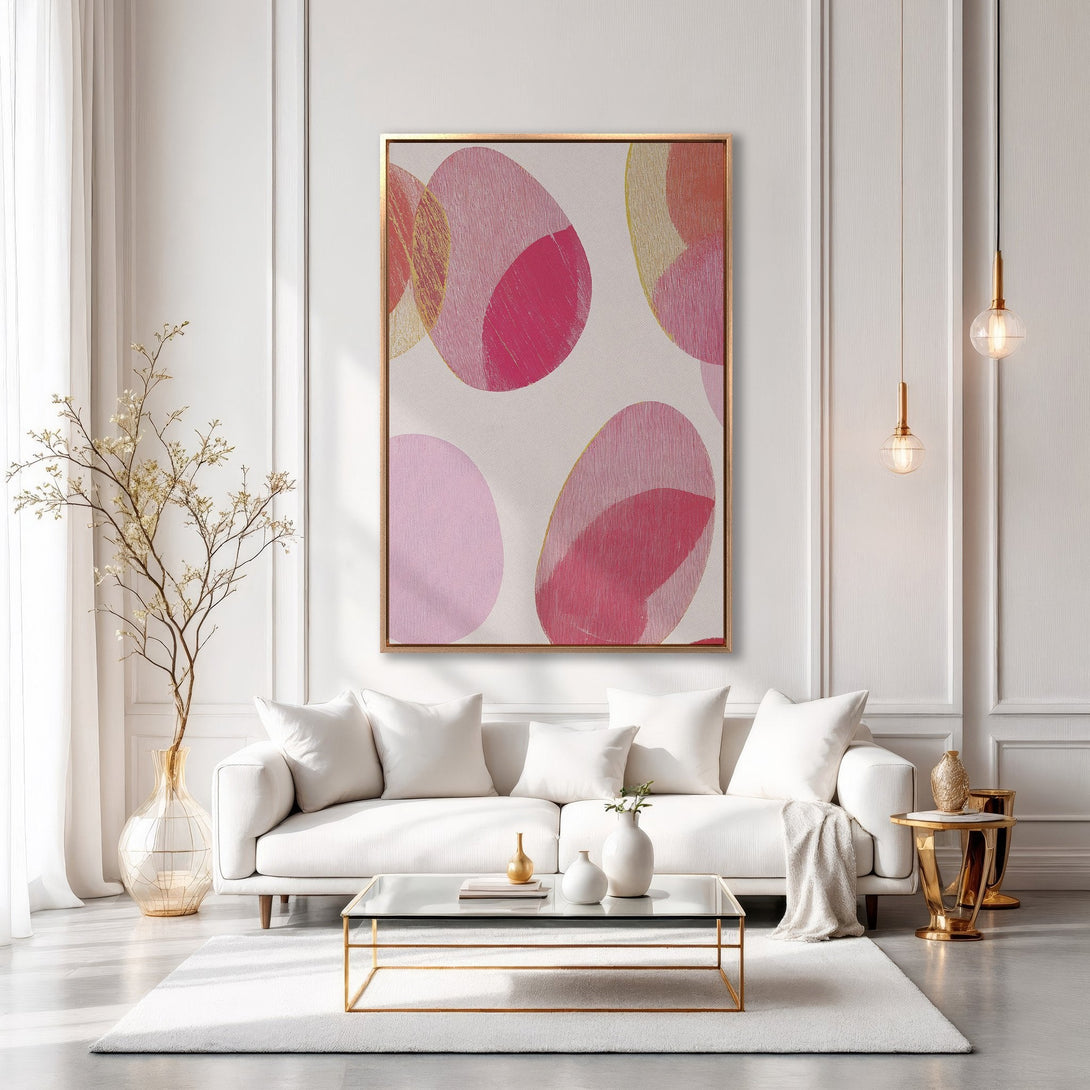Framed Wall Art: Abstract pink & gold circles canvas print. Modern art for living room decor. Stylish, minimalist design with a warm color palette.