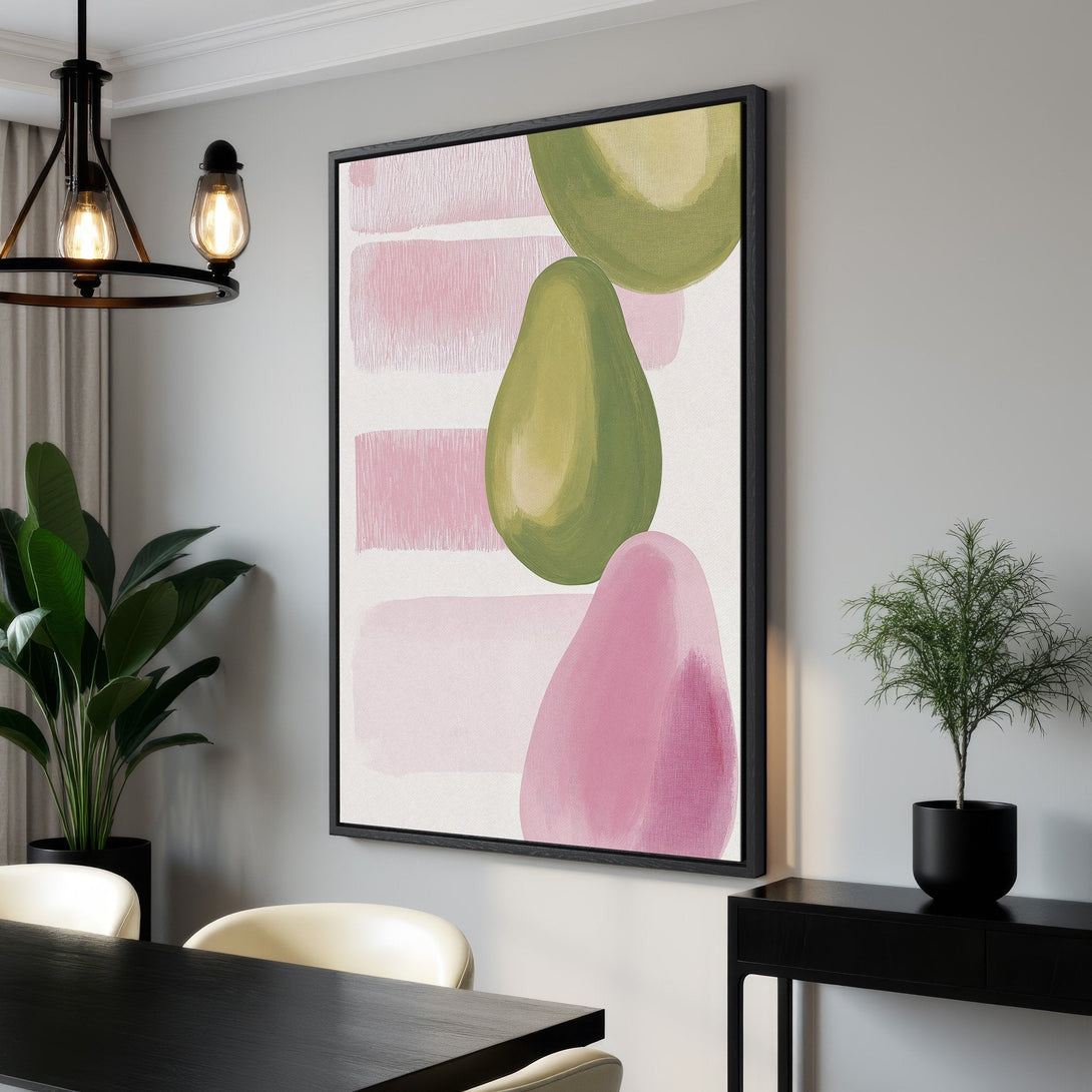 Framed Wall Art featuring abstract avocado shapes in a modern style. Soft pink and green color palette adds a touch of elegance to any interior.