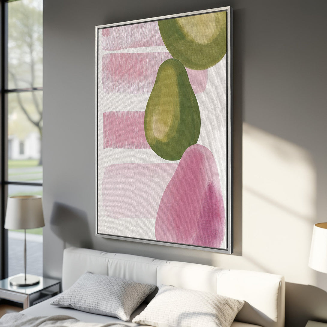 Framed Wall Art featuring abstract avocado shapes in pink and green hues. Modern art canvas print perfect for adding a pop of color to any room.